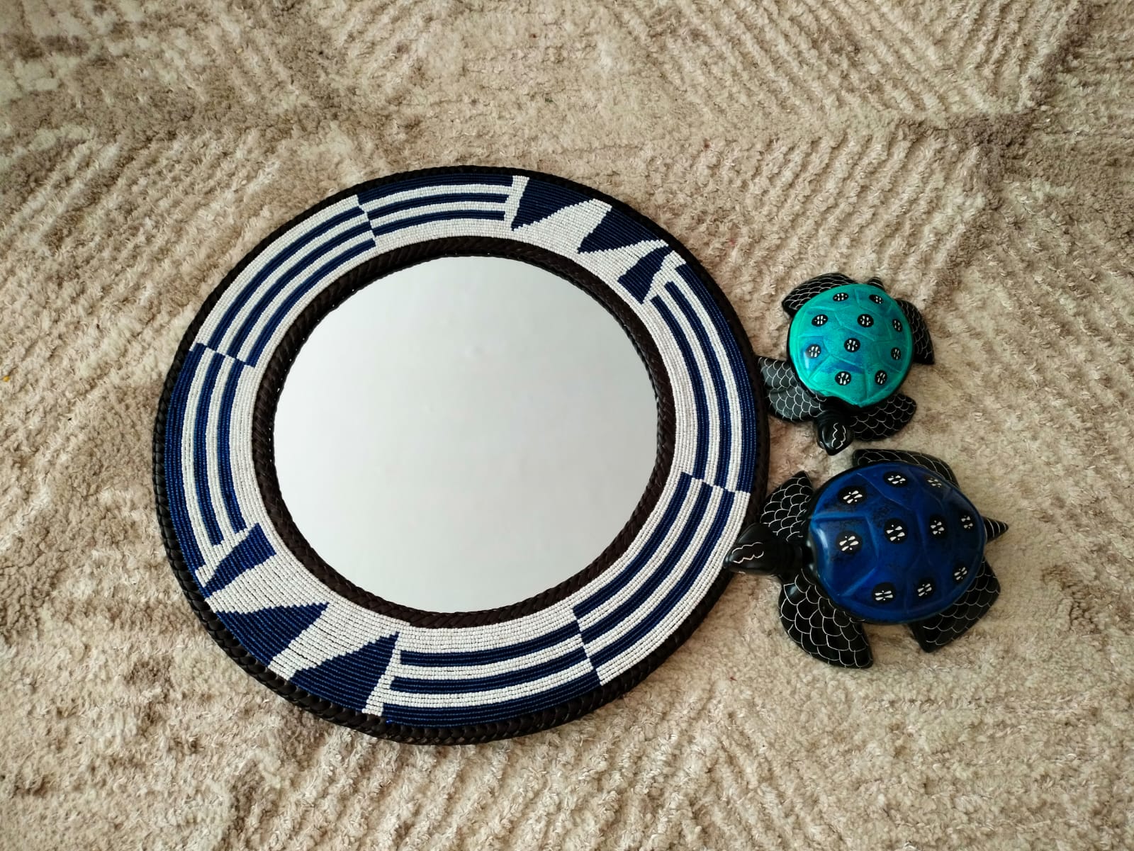 Midnight blue beaded mirror.