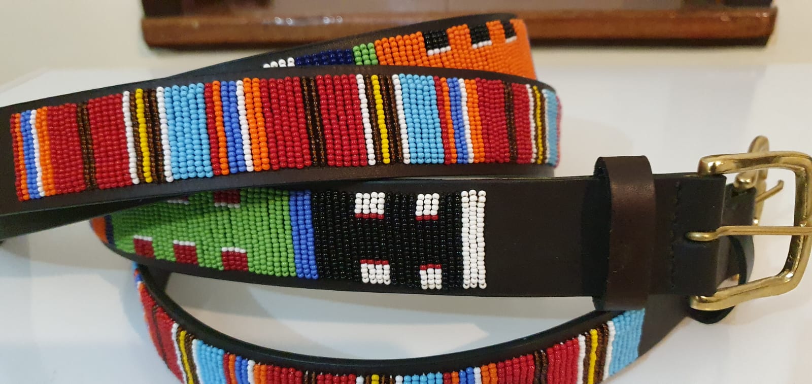 Leather belts with beaded patterns
