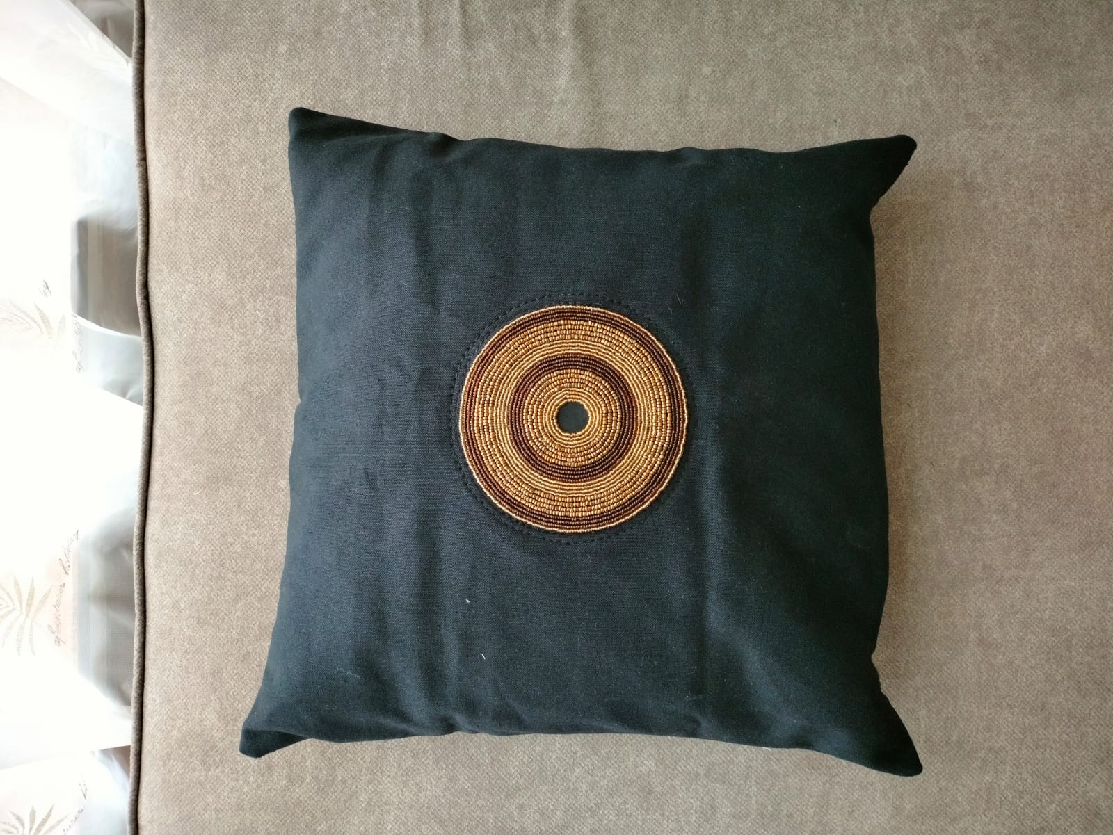 Black linen throw cover with beads