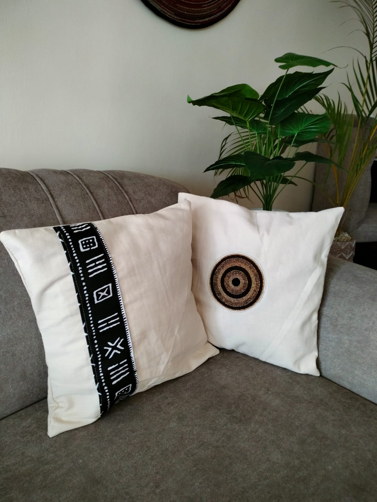 Beaded white linen throw cover with tribal pattern