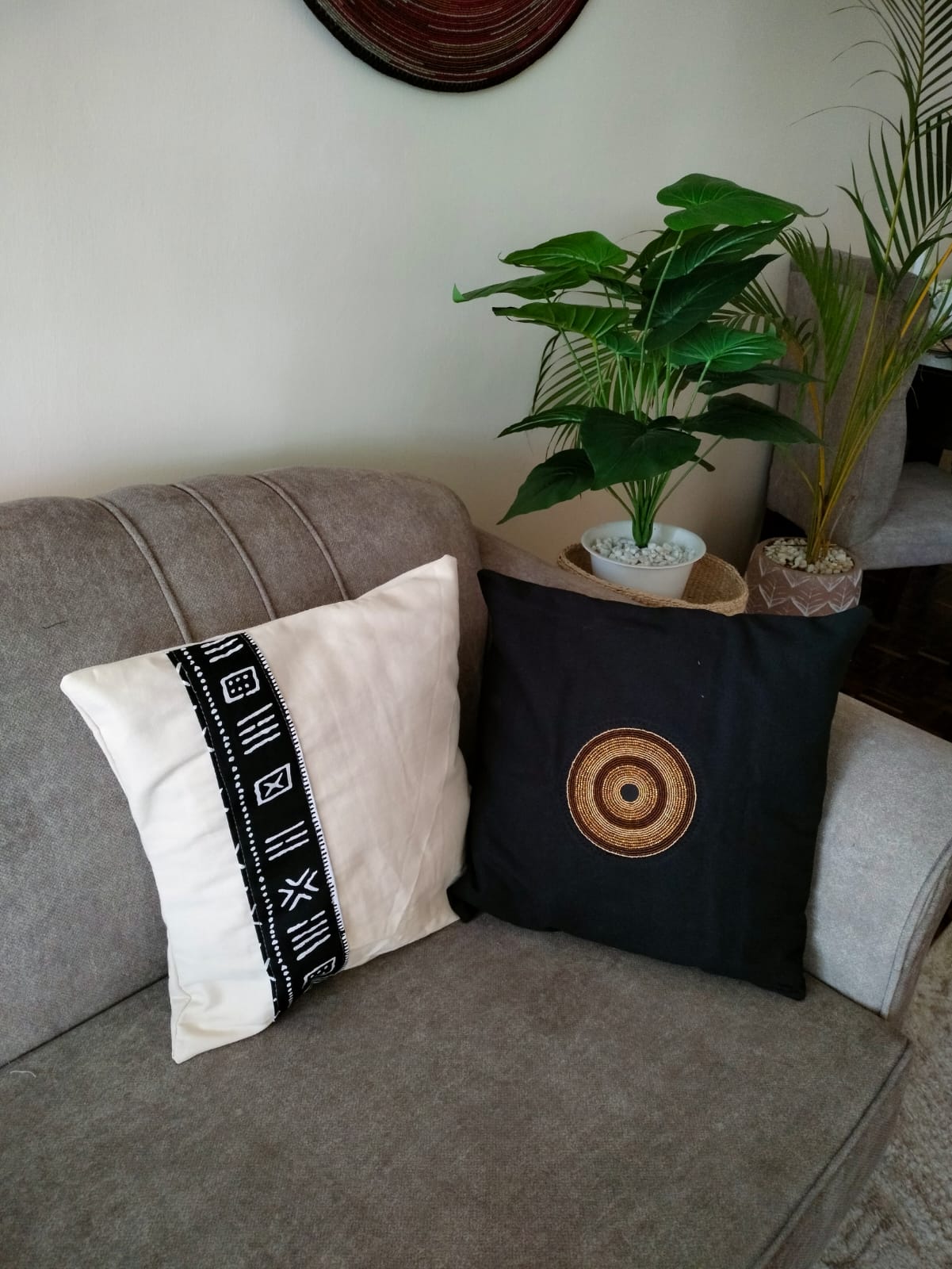 Beaded white linen throw cover with tribal pattern