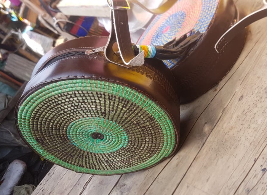 Elegant green beaded faux leather sling bag