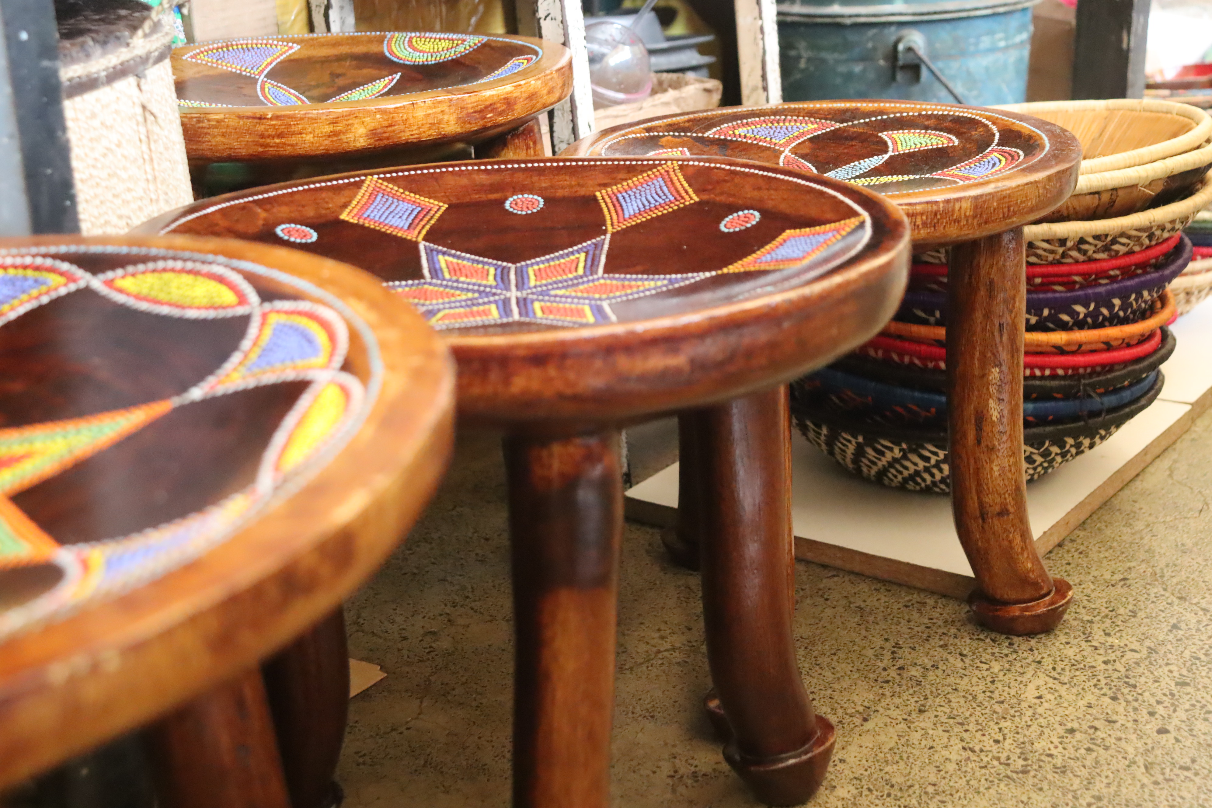 Timeless 4-legged traditional stool with beaded star pattern