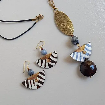 Golden glow brass with blue beads necklace