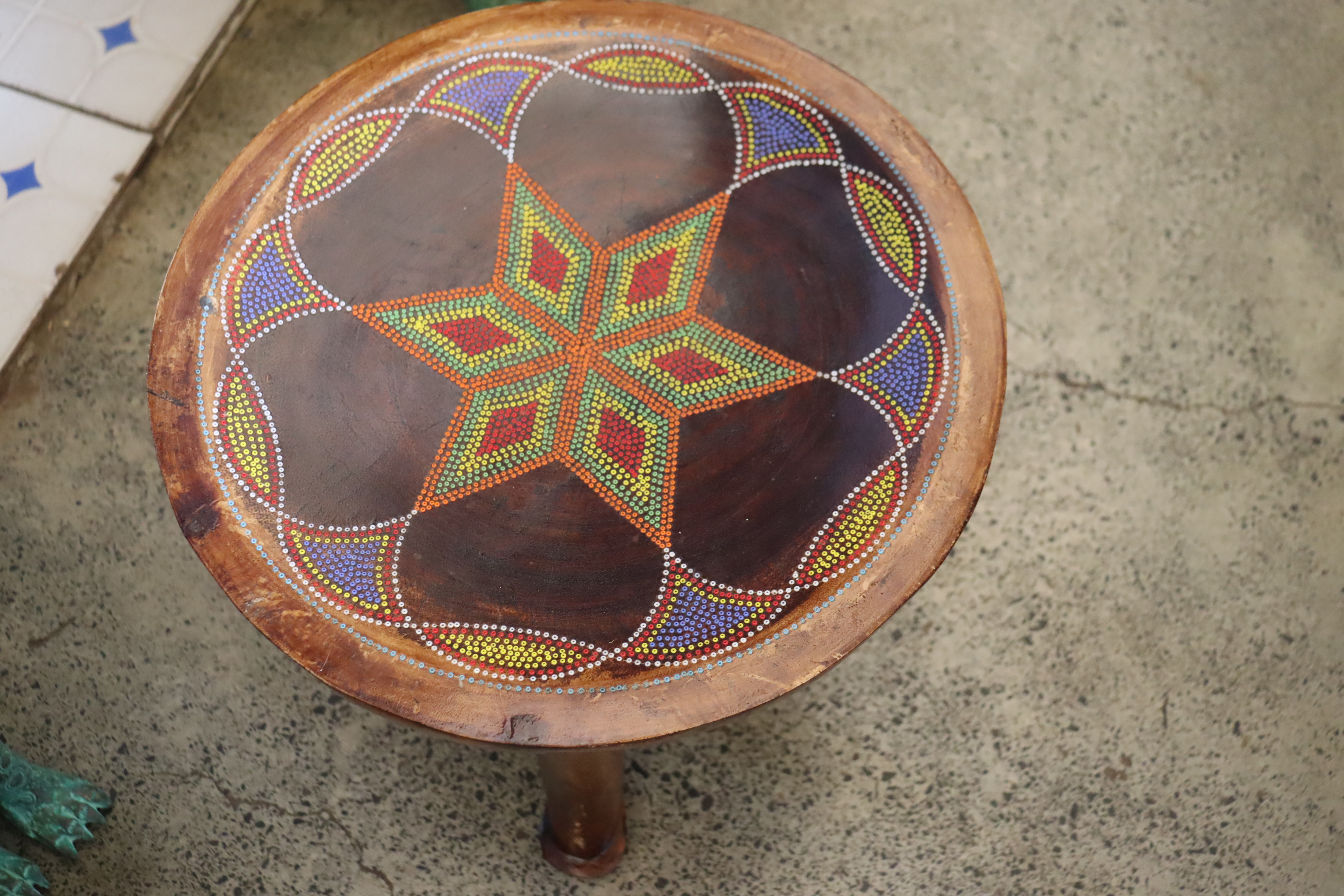 Three-legged beaded traditional stool