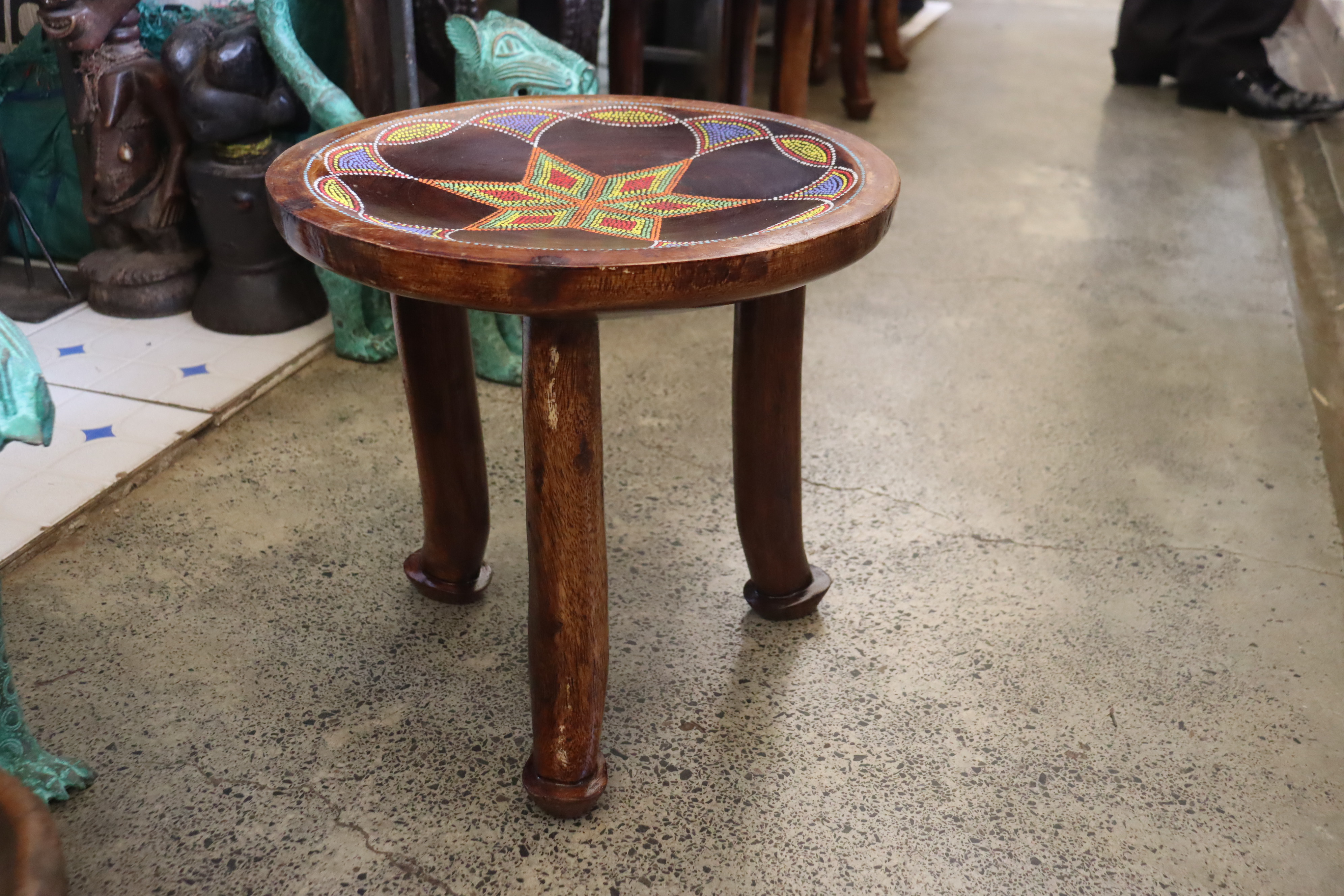 Three-legged beaded traditional stool